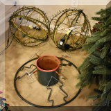 D104. 2 Light-up spherical Christmas decorations. - $10 each